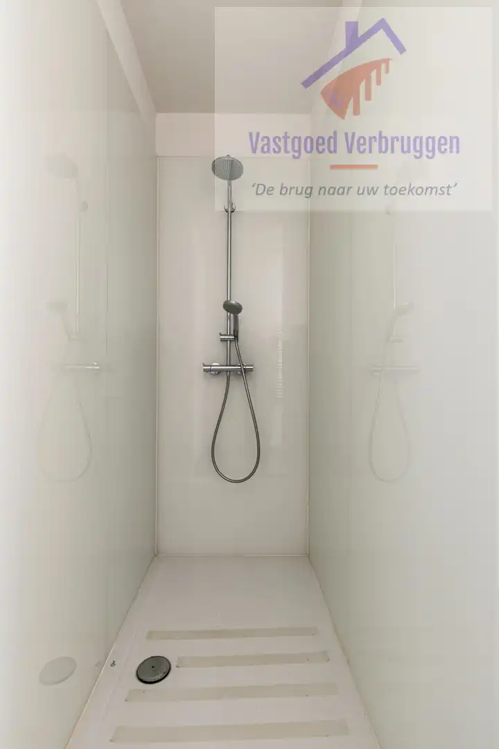 Modern recent gelijkvloers appartement met zuidgericht terras, zonnepanelen en garagebox in hartje Nieuwerkerken foto 6