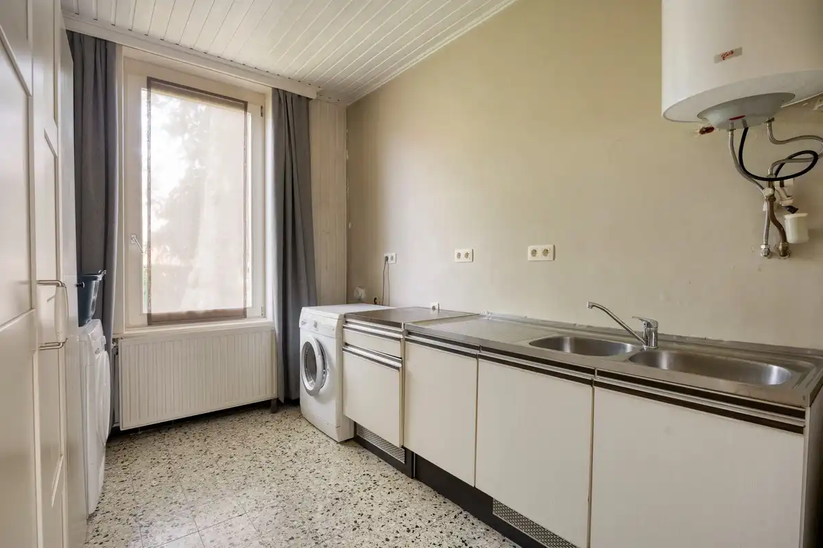Bijzonder historisch herenhuis te koop in Heppen foto 27