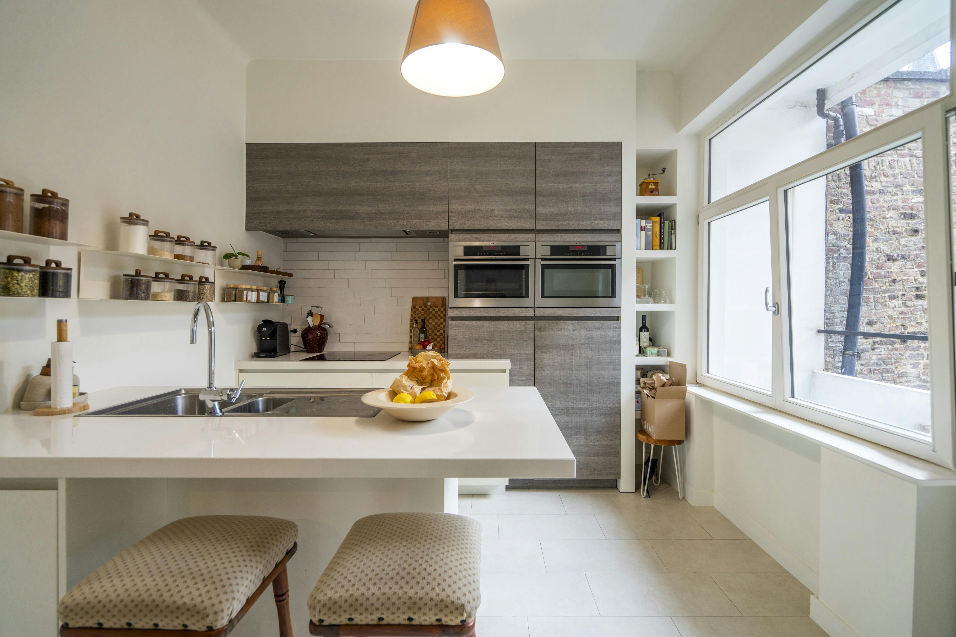 Verhuurd handelspand met appartementen te koop in Kortrijk (opbrengsteigendom) foto 11