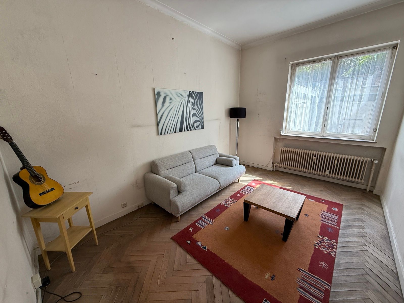 Te renoveren gelijkvloers appartement met 2 slaapkamers foto {{pictureIndex}}