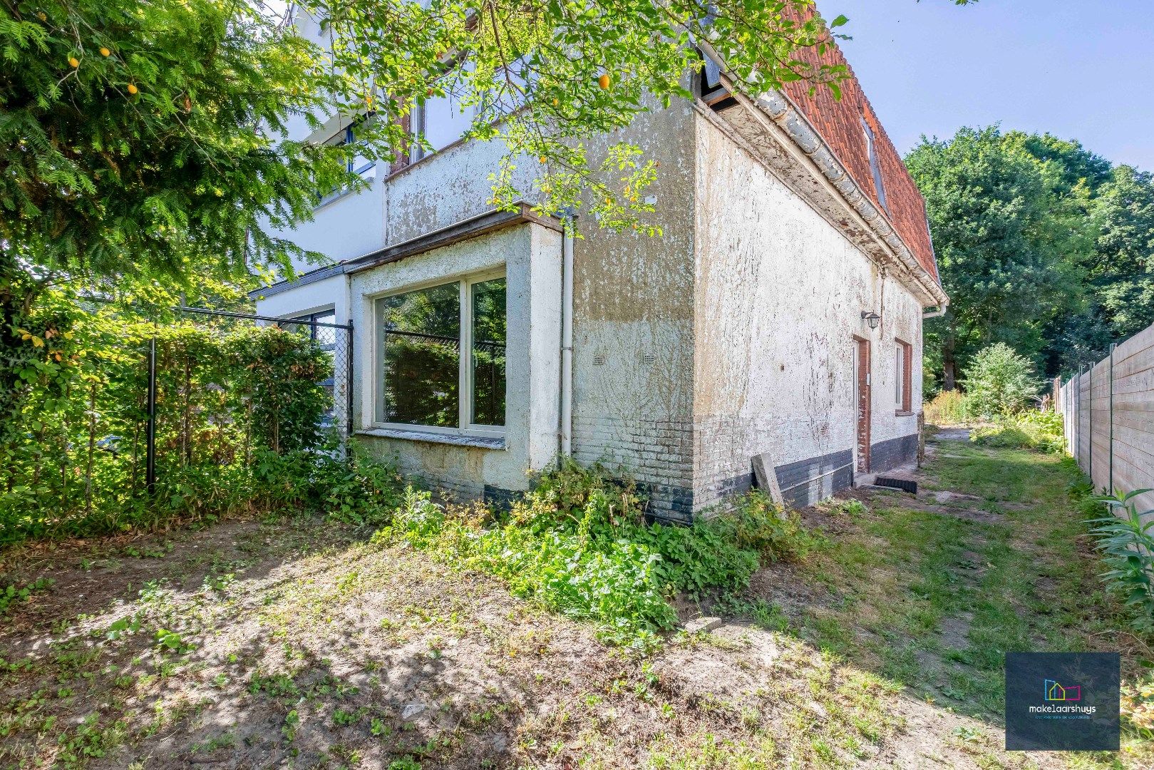 VERKOCHT !!! Residentieel gelegen  te renoveren halfopen bebouwing met tuin  foto 27