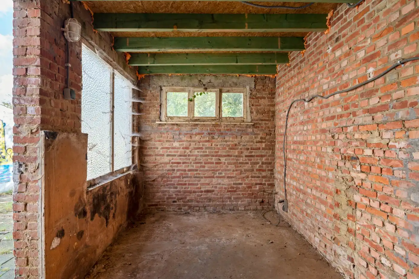Deels gerenoveerde gezinswoning met 3 à 4 slpk. en tuin foto 11