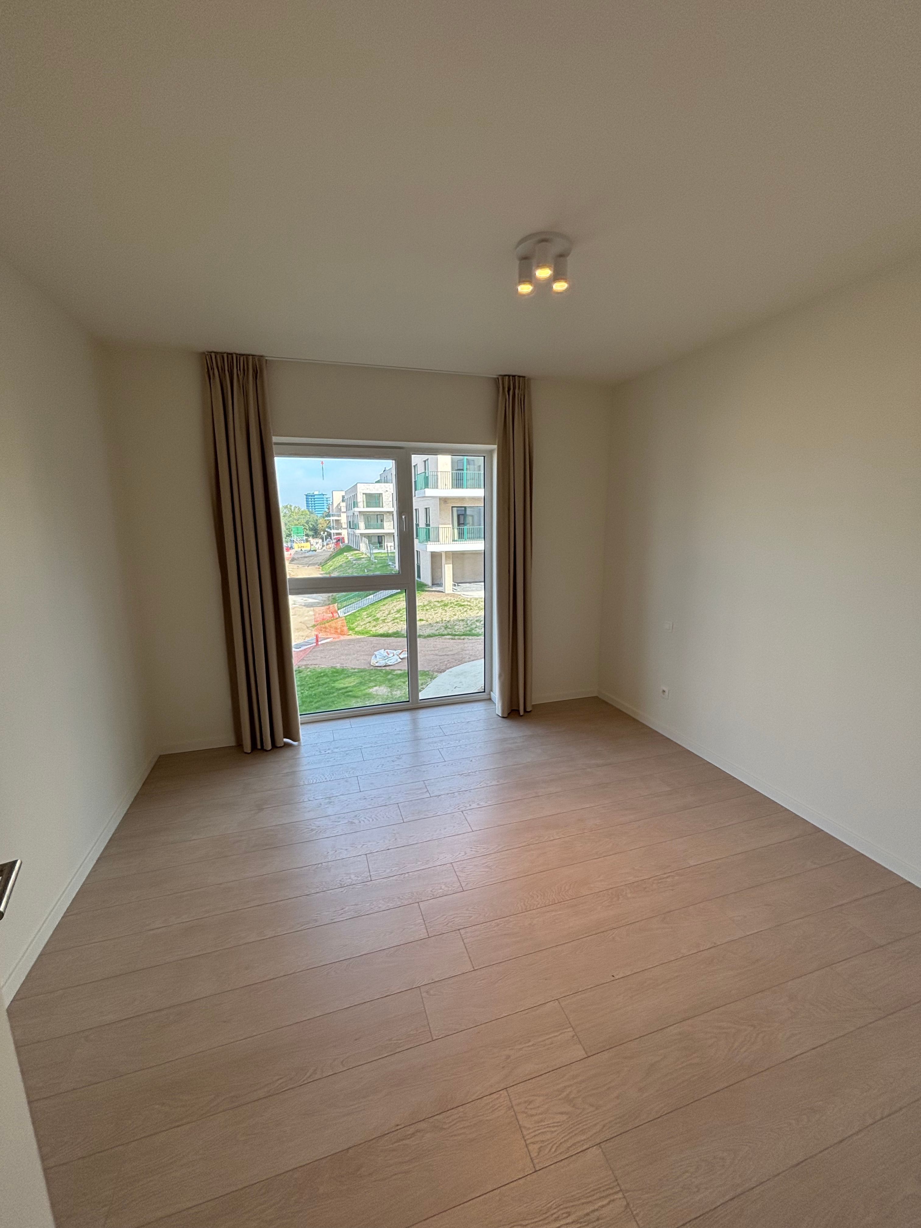 Nieuwbouw 2-slaapkamerappartement met bureau/dressing foto 7