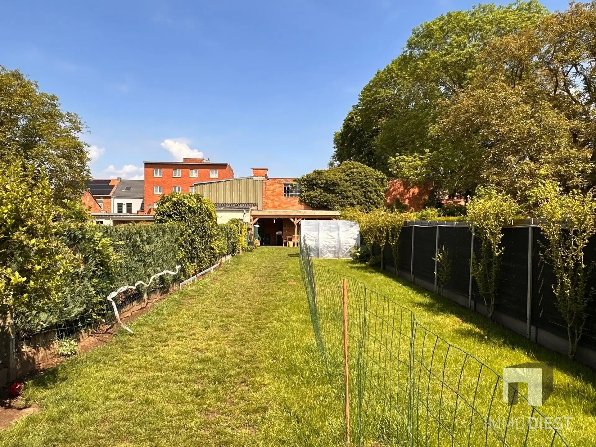 Zonnige woning met 3 slpks, garage en tuin foto 34