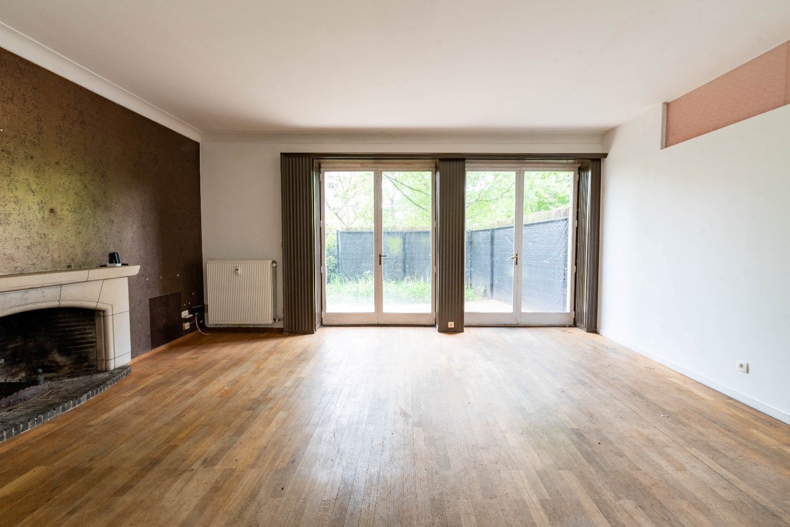 Gelijkvloers appartement met tuin foto {{pictureIndex}}