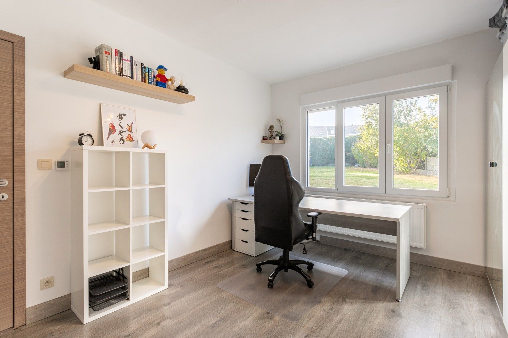 Rustig gelegen halfopen woning met tuin en garage foto 16