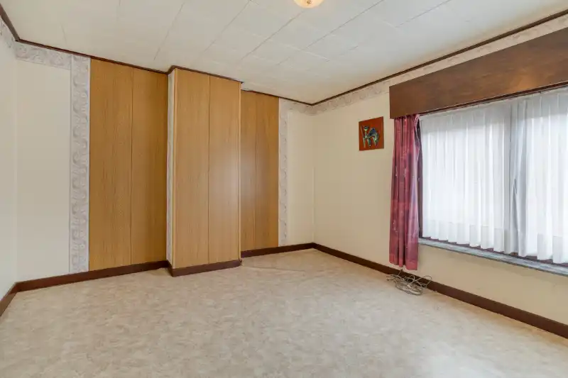 HALFOPEN BEBOUWING MET VEEL RENOVATIEPOTENTIEEL EN RUIM DAKTERRAS foto 24