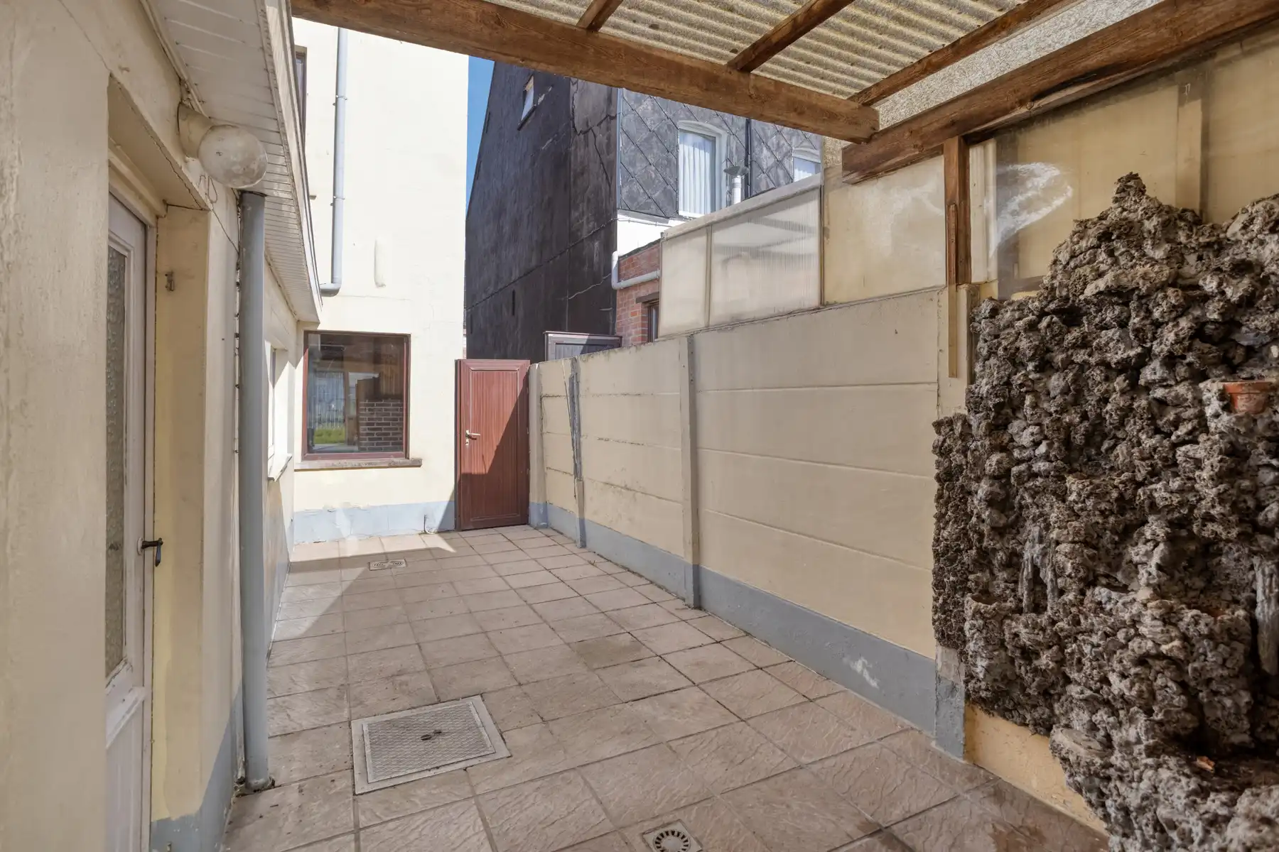 Te renoveren halfopen woning met zonnige tuin in rustige straat nabij Aalst foto 27