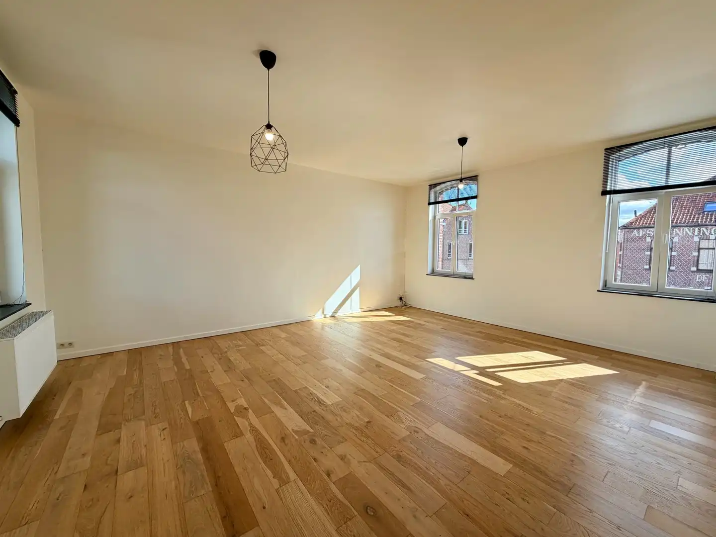 Gerenoveerd duplex-appartement met twee slaapkamers te Ardooie centrum! foto 2