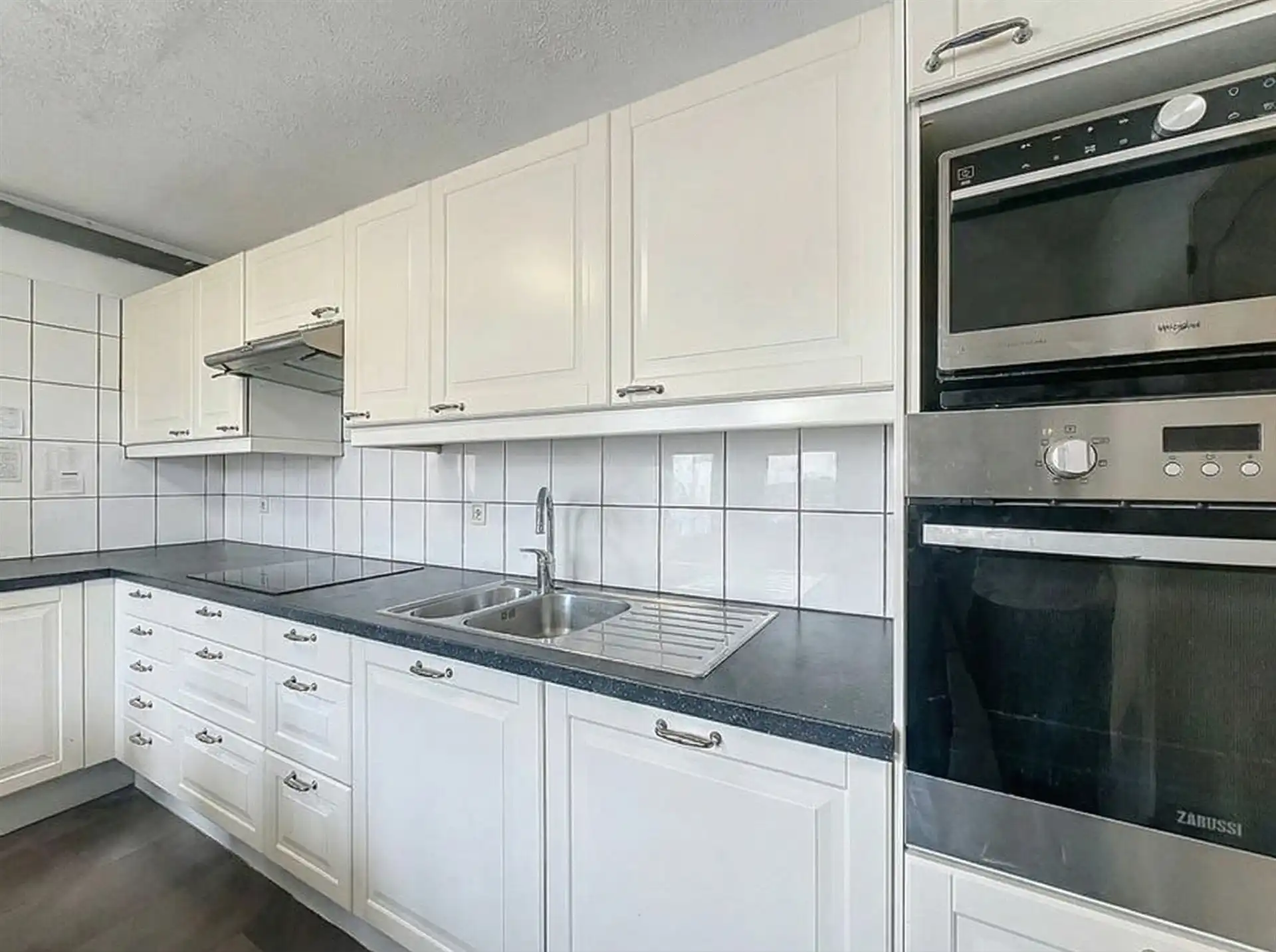 Energiezuinige gezinswoning met 6 slaapkamers en riante tuin in hartje Kruibeke! foto 3