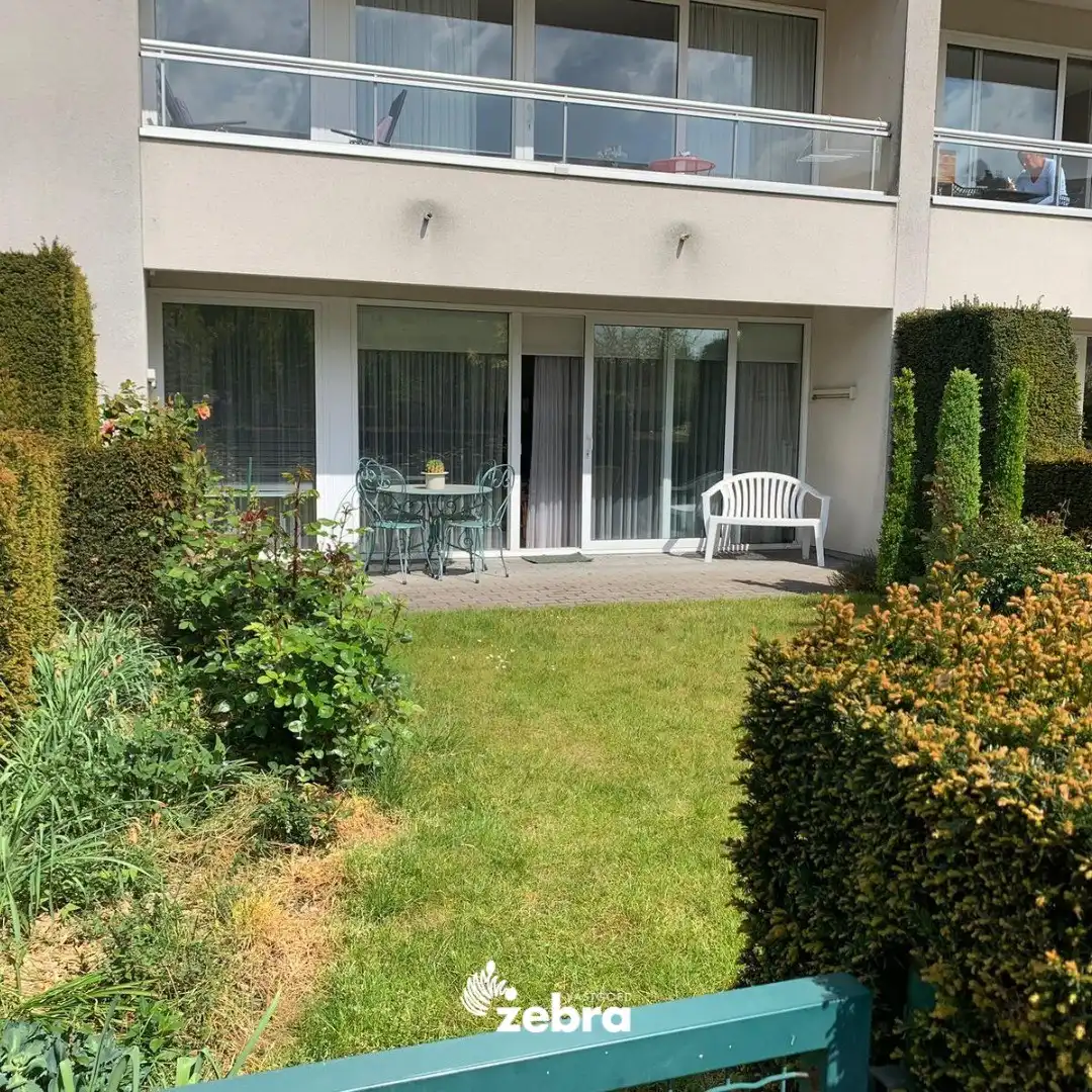 Gelijkvloers appartement met zuidoost gerichte tuin te Roeselare! foto 18