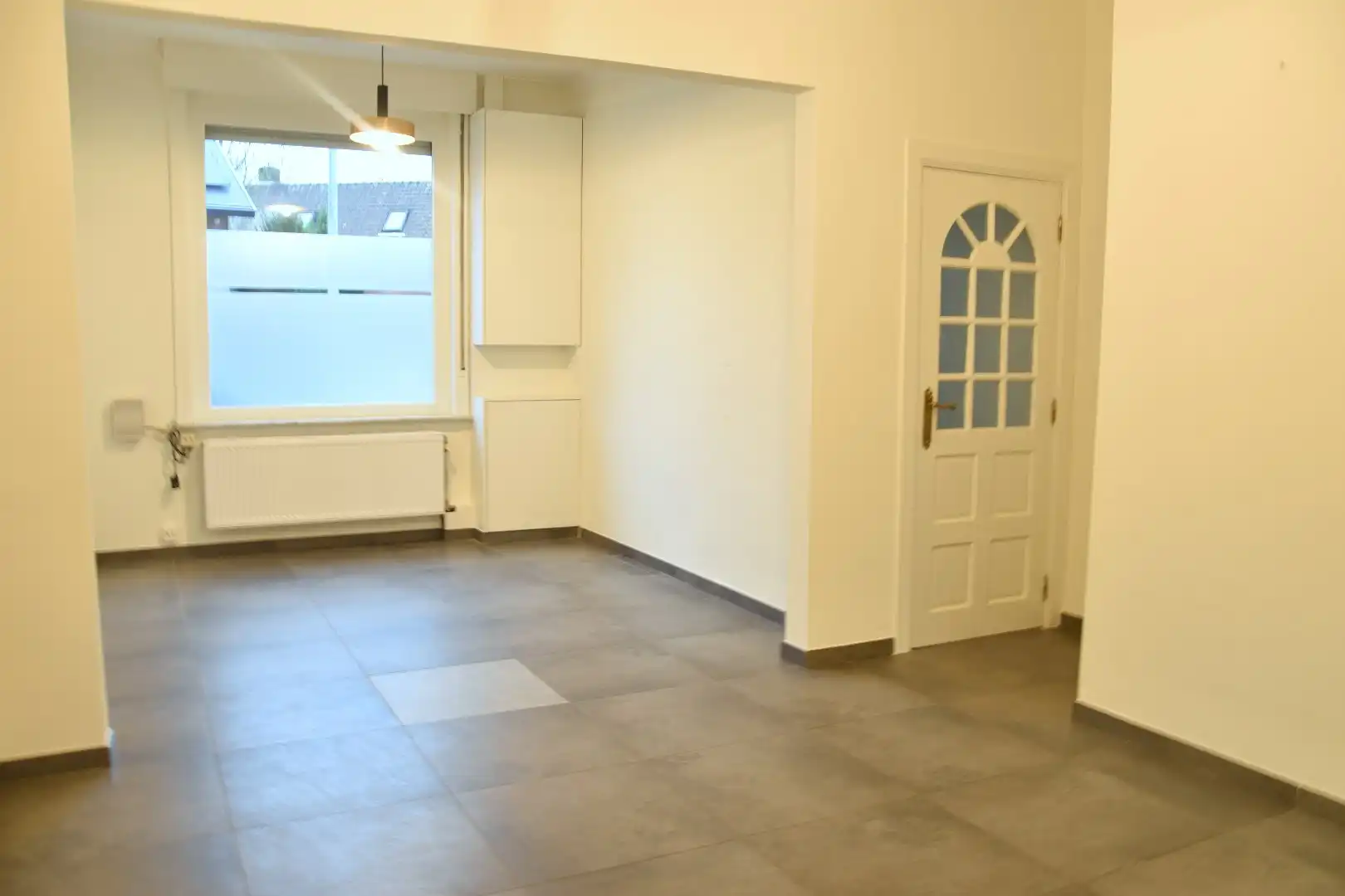 Vernieuwde rijwoning met 3 slaapkamers en een mooi stukje tuin te koop in Bellegem foto 4