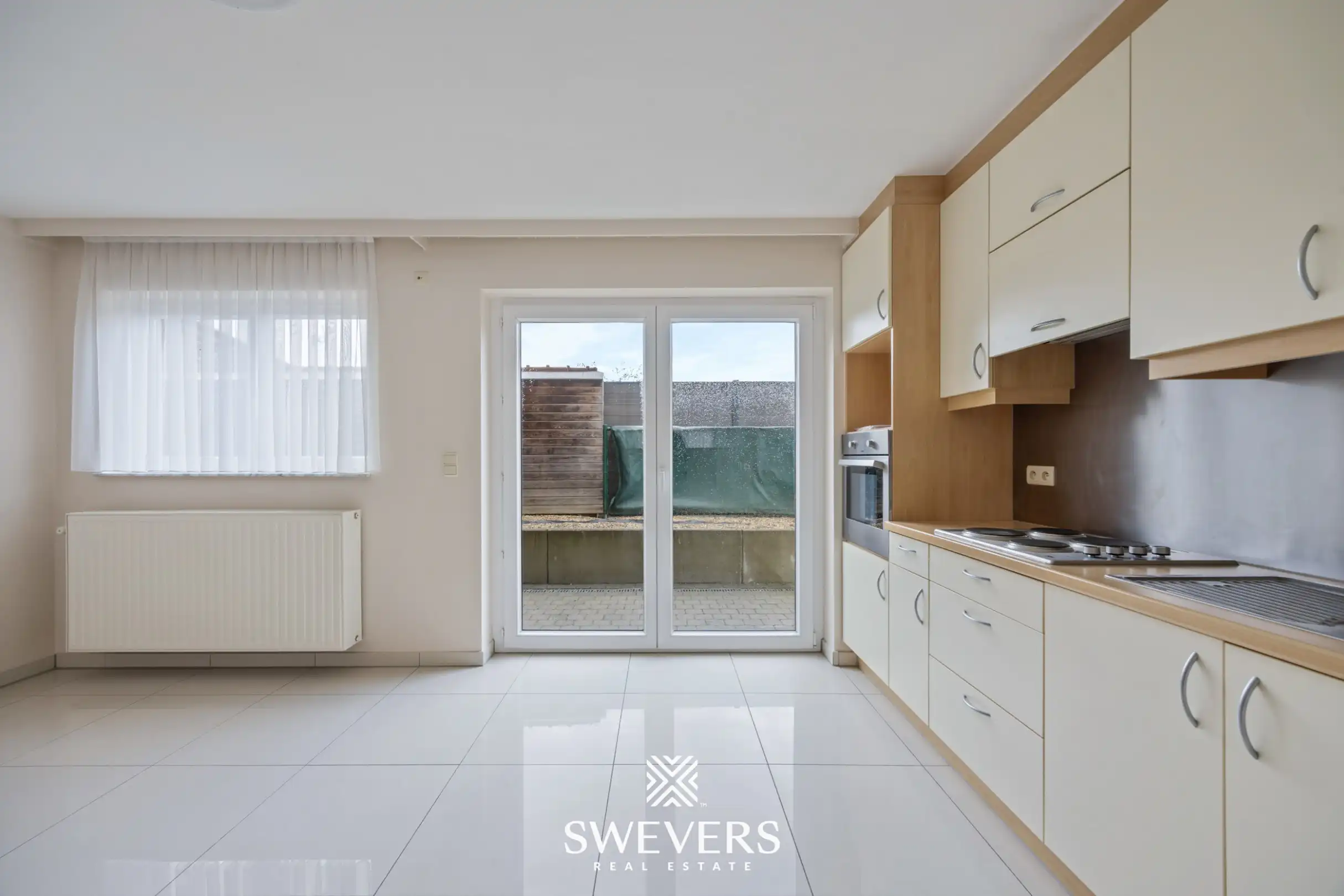Uitstekend gelegen gelijkvloers appartement met 2 slaapkamers en private tuin foto 6