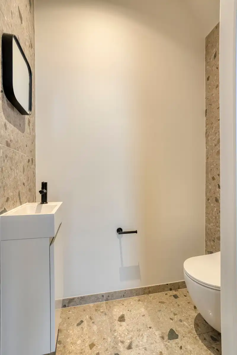 Verscholen achter een charmante groene gevel: prachtig gerenoveerde woning met 3 slaapkamers foto 16