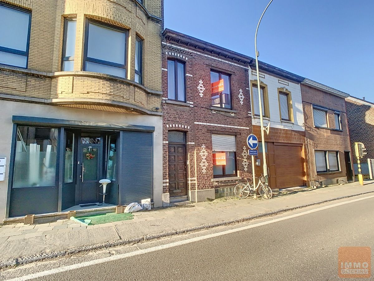 Toffe rijwoning met tuintje foto 1