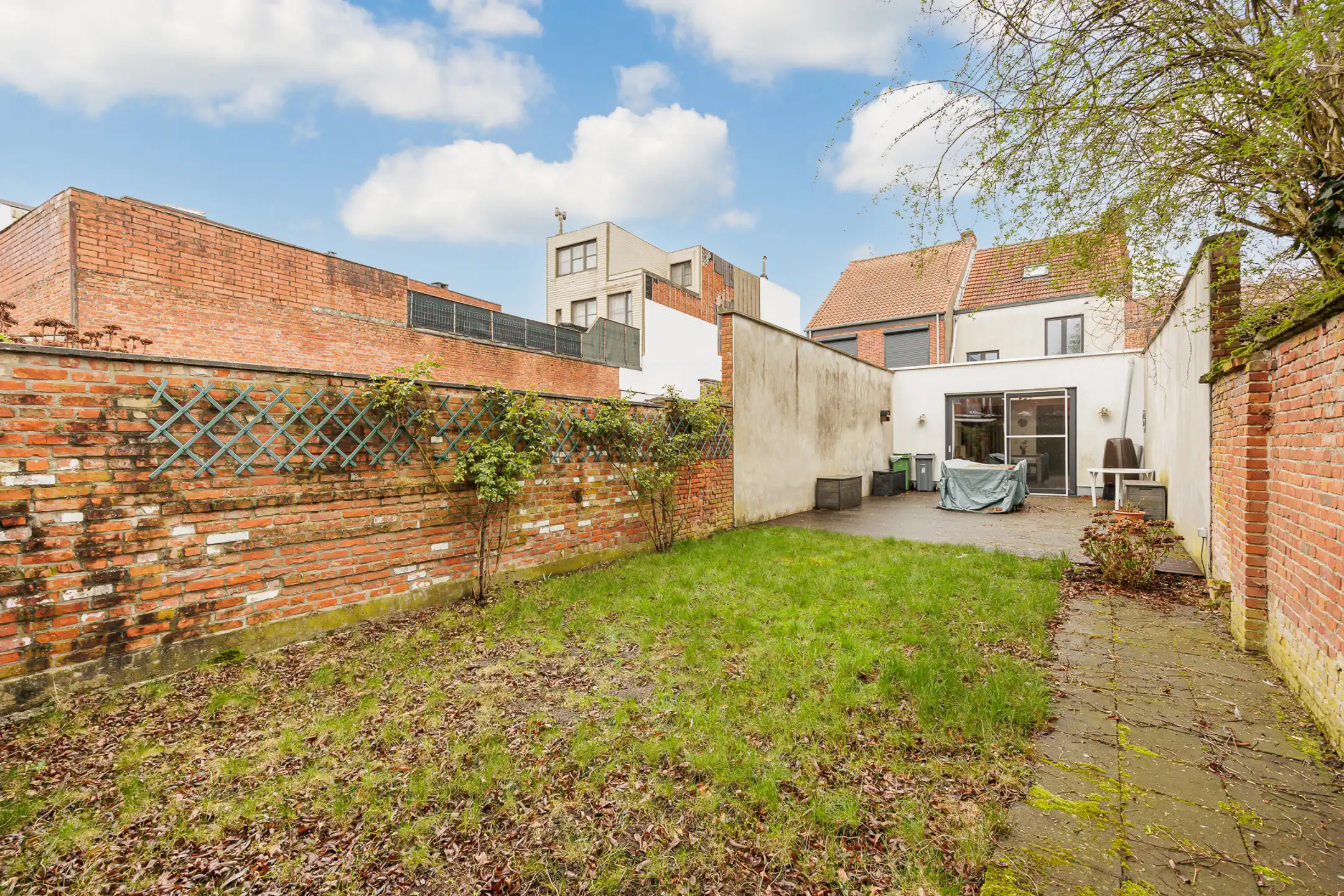 Instapklare  woning met drie slaapkamers en stadstuintje foto 32