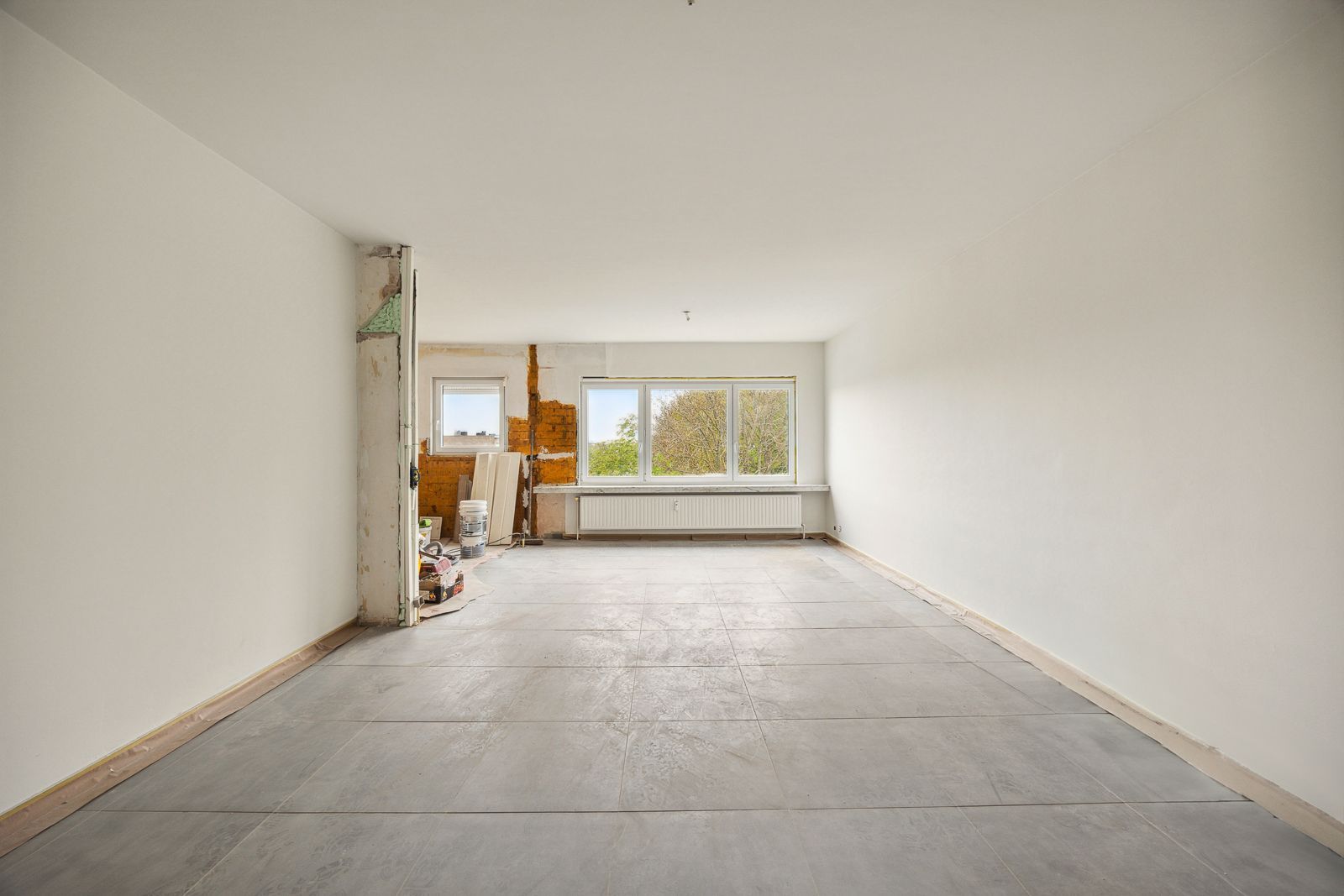Totaal gerenoveerd appartement met 2 slaapkamers én garagebox met zicht op het groen! foto 3
