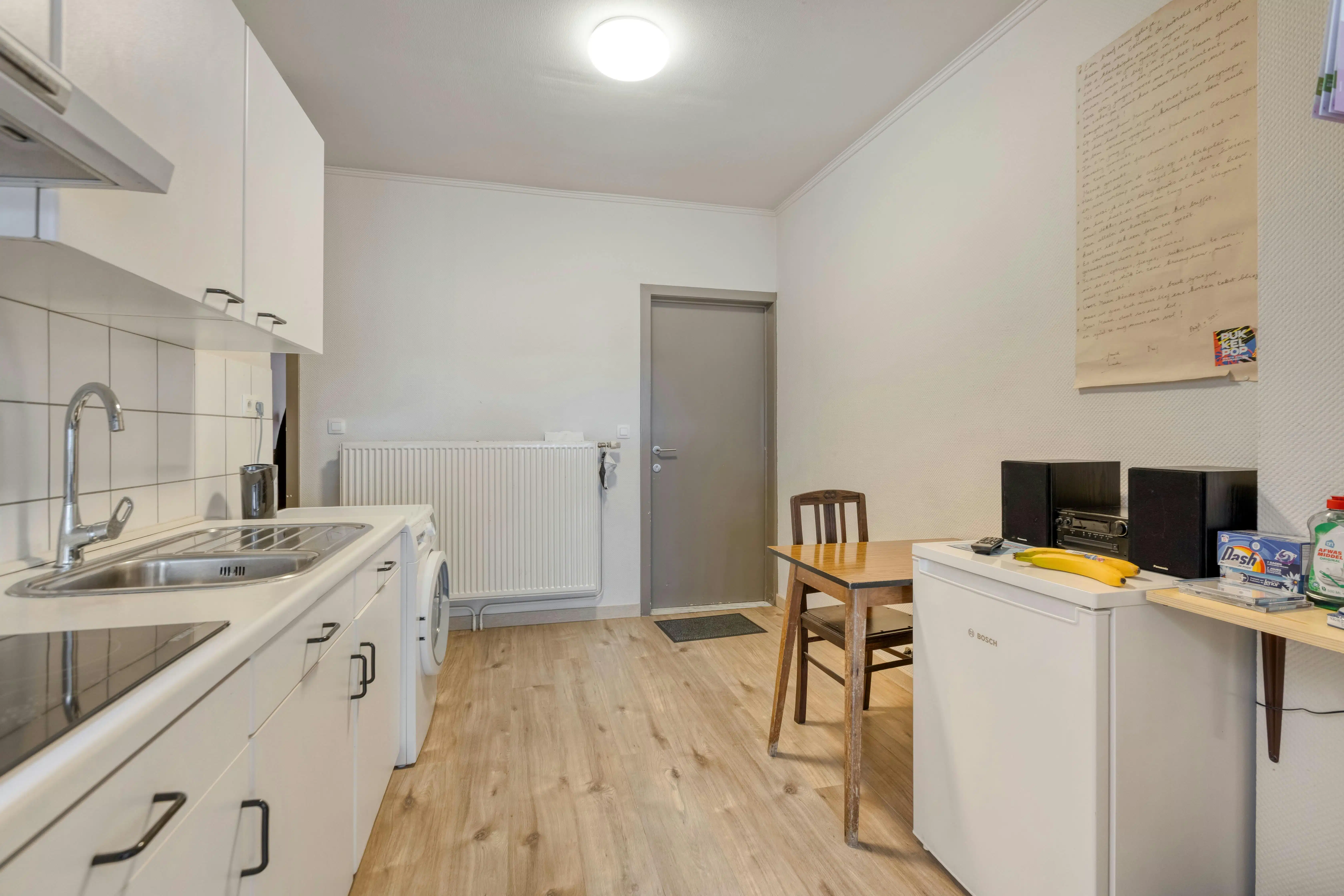 Op te frissen investeringspand met 2 appartementen in hartje Maaseik foto 5