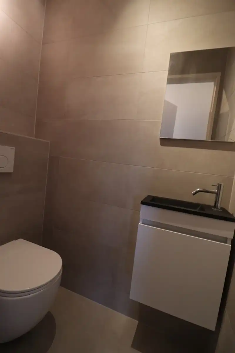 Recent gerenoveerd dakappartement met balkon, terras en garage. foto 8