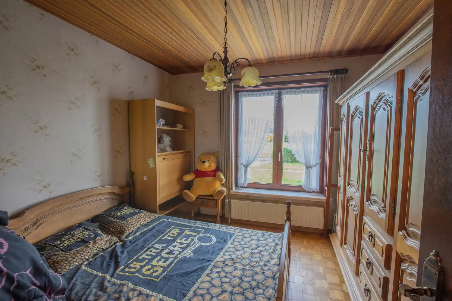 Rustig gelegen alleenstaande woning met westgerichte tuin en unieke bouwvergunning foto 16