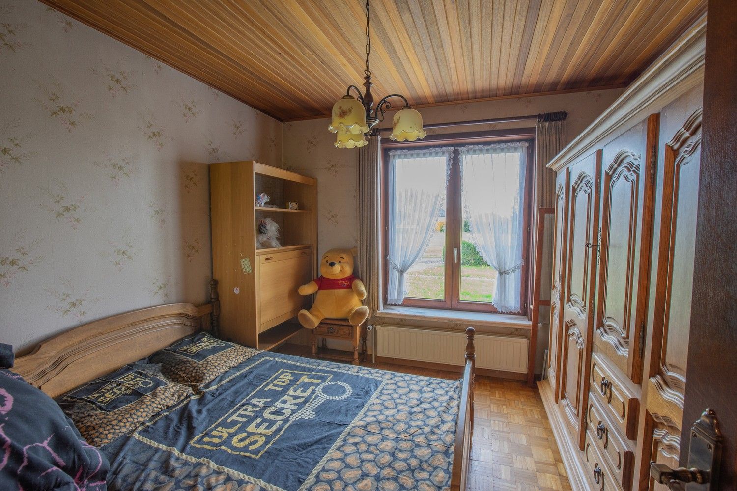 Rustig gelegen alleenstaande woning met westgerichte tuin en unieke bouwvergunning foto 16