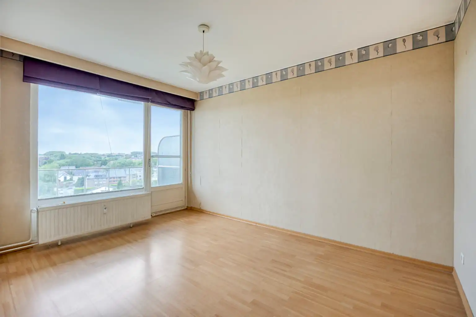 Lichtrijk appartement met open zicht, op te frissen foto 14