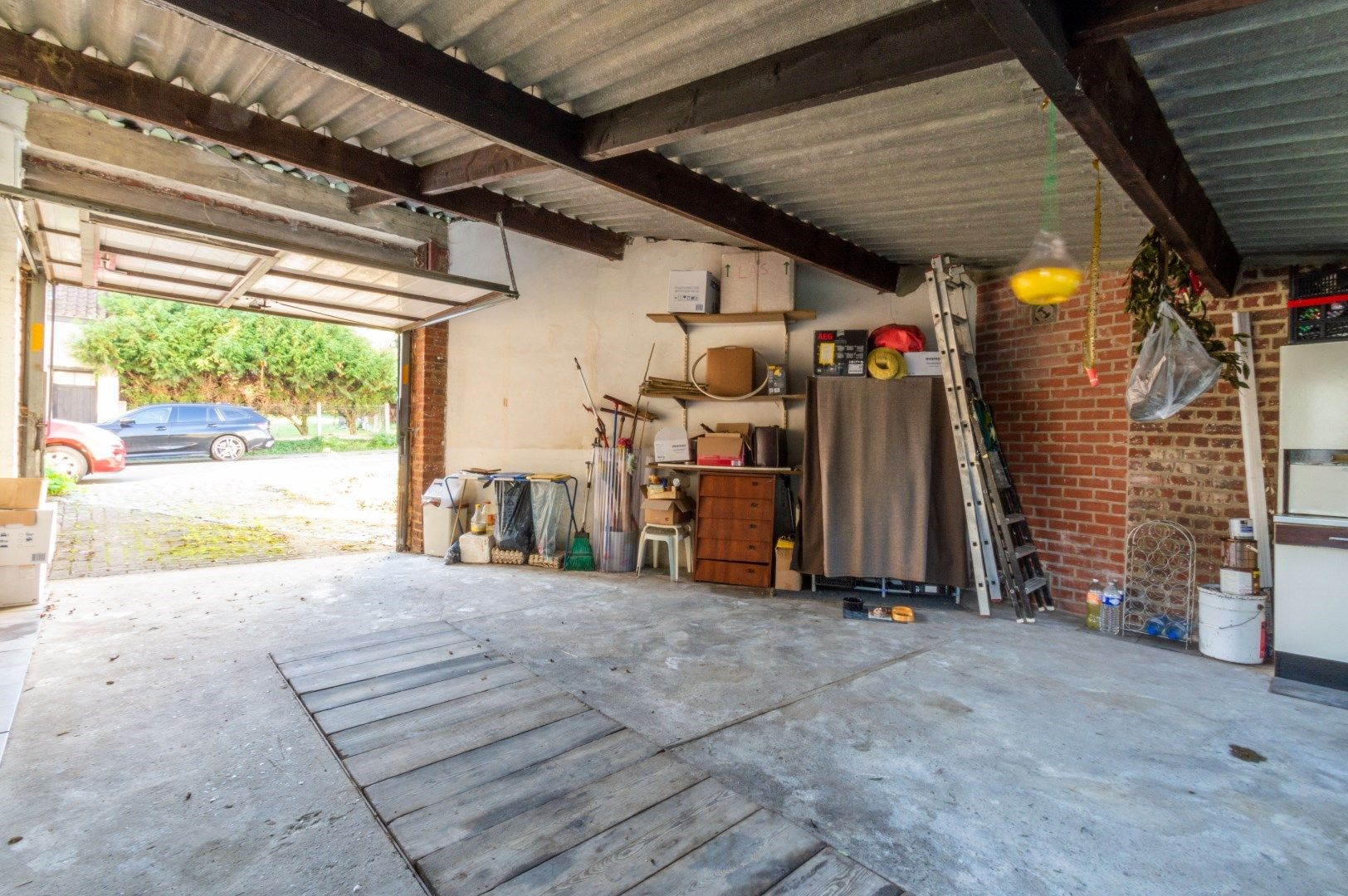 Ruime en lichtrijke driegevelwoning met garage + atelier! foto 14