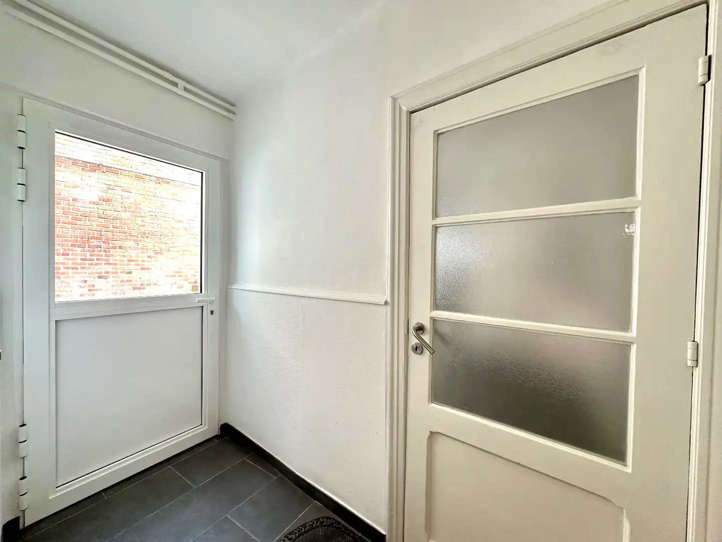 Woning met 2 ruime slaapkamers in het centrum van Bilzen. foto 7