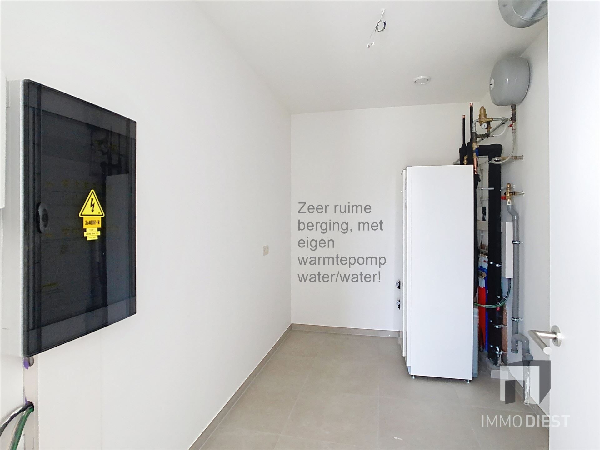 Gelijkvloers appartement met terras en tuintje foto 10