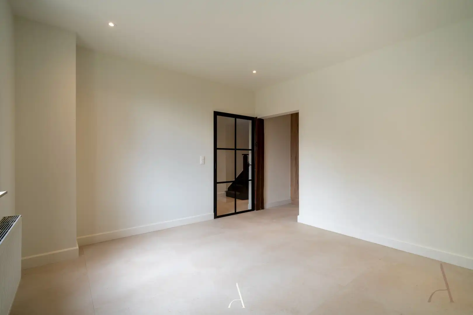 Volledig gerenoveerde stadswoning van 269 m² met 6 slaapkamers en carport in het centrum van Maaseik foto 10