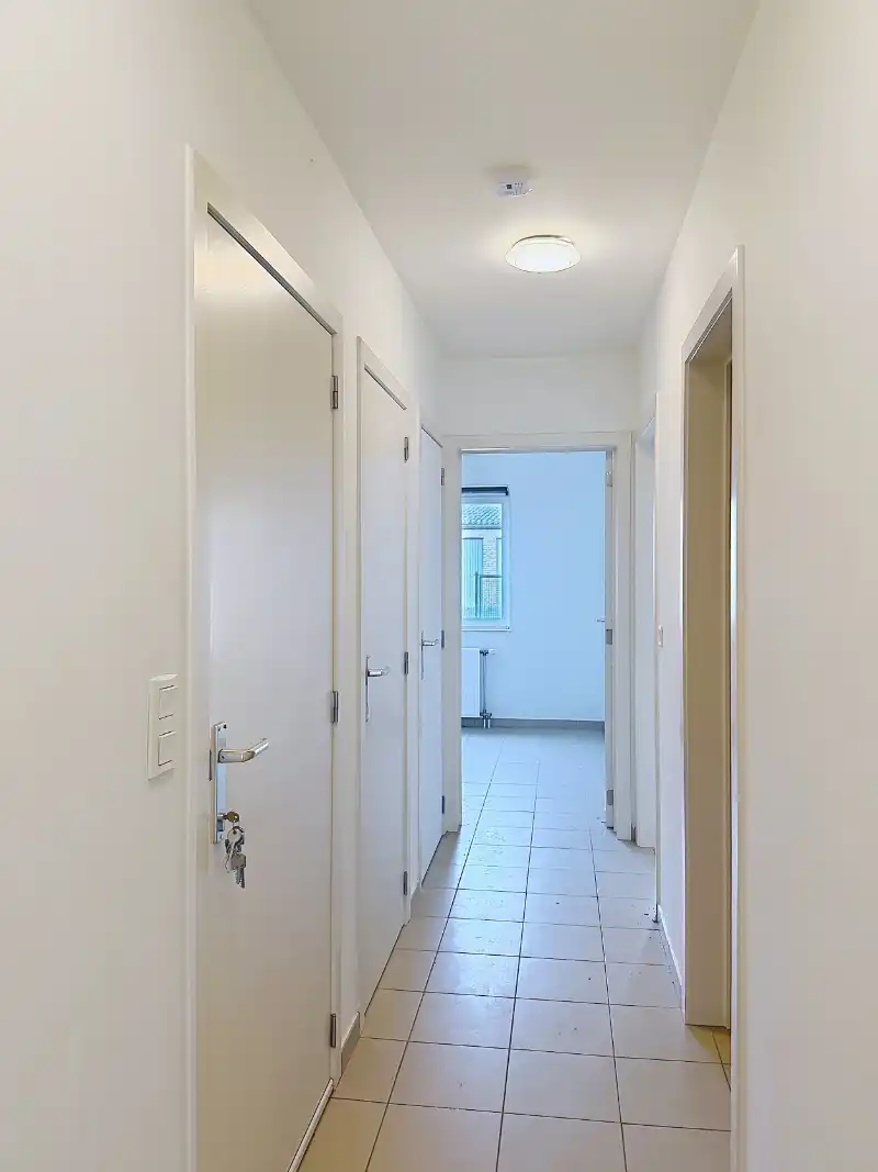 Gelijkvloers appartement met 2 slaapkamers en tuin foto 4