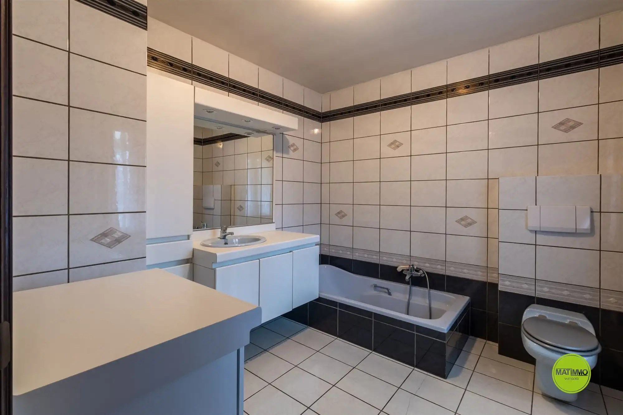 Gelijkvloerse woning met grote tuin in Leopoldsburg foto 11