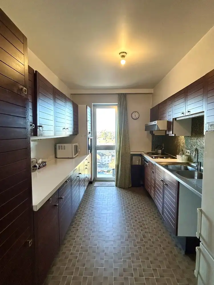 Ruim 3-kamerappartement met garagebox en autostaanplaats foto 11