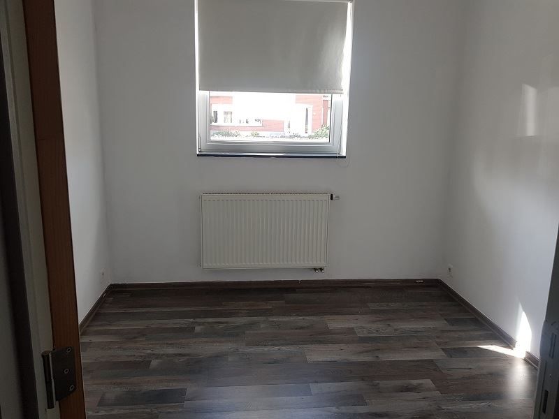 Gezellig gelijkvloers appartement met tuin, autostaanplaats en kelderberging foto 3