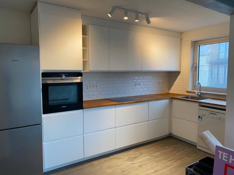 Ruim (±100m²) app met 2 slpk en autostaanplaats in hartje Geel foto 9