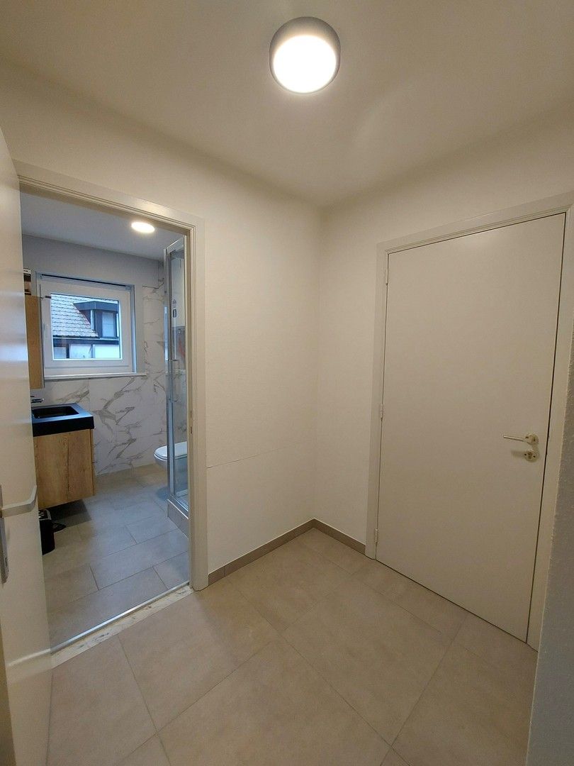 Totaal gerenoveerd appartement met 1 slaapkamer met zicht op de Leie ! foto 10