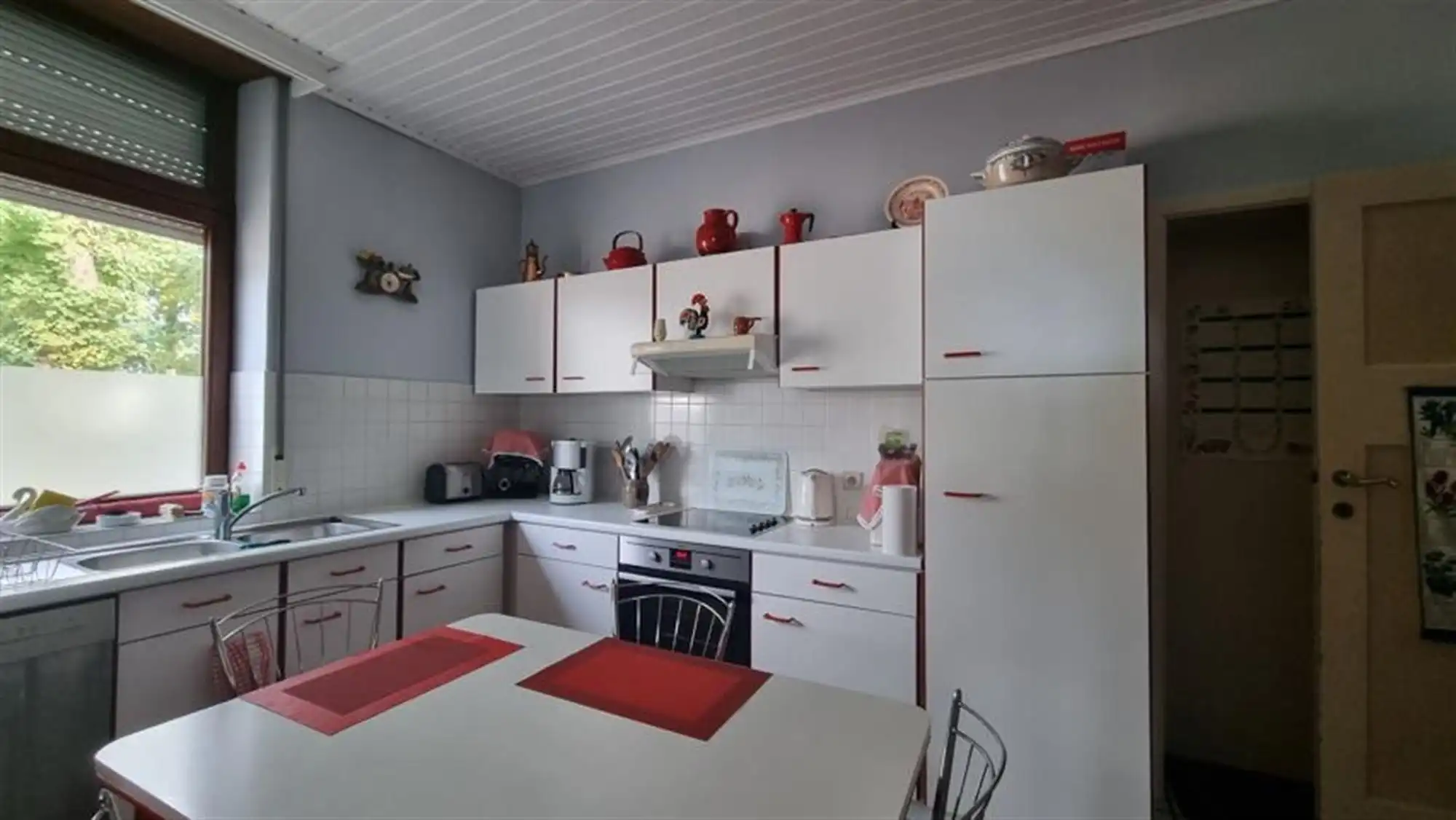 Aangename 3-gevel woning met tuin foto 8