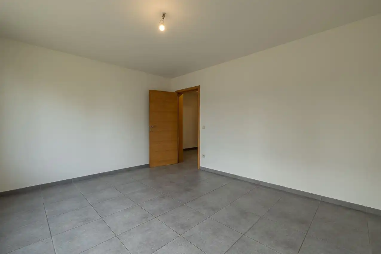 Gelijkvloers appartement met 2 slpk., terras en garagebox foto 14