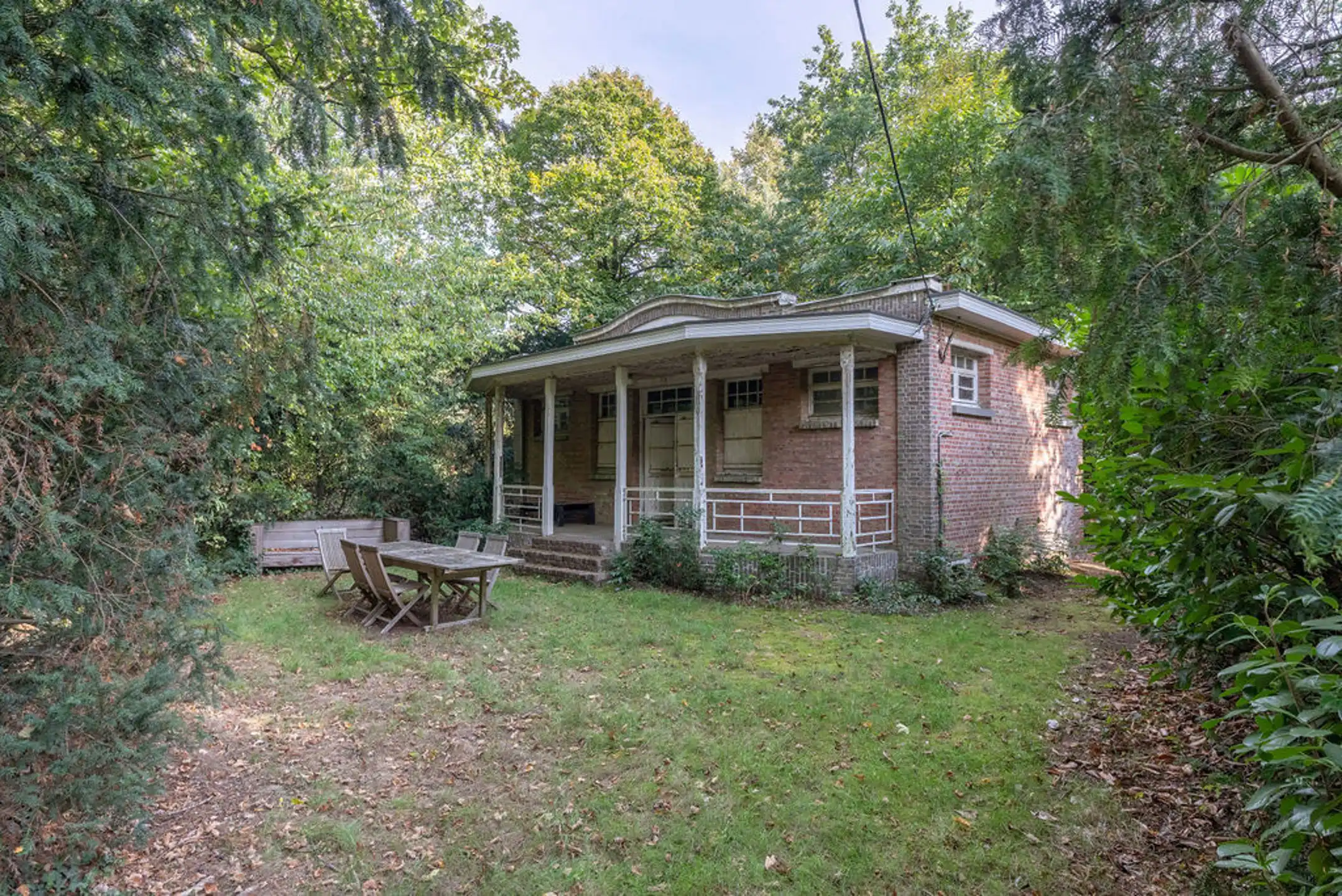 Bouwgrond / grondig te renoveren woning op 7.106m² grond. foto 5