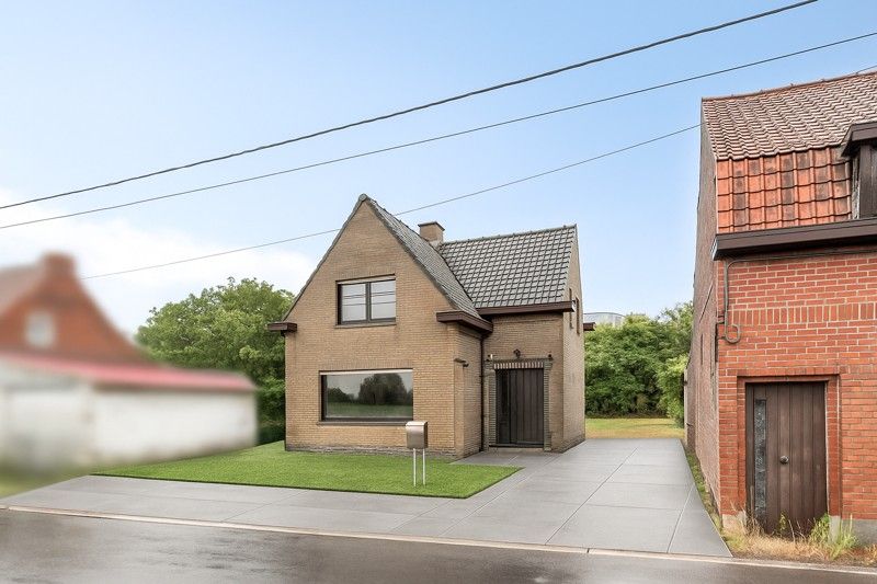 🏡 Gezellige alleenstaande woning met zonnige tuin TE KOOP in Wielsbeke! foto {{pictureIndex}}