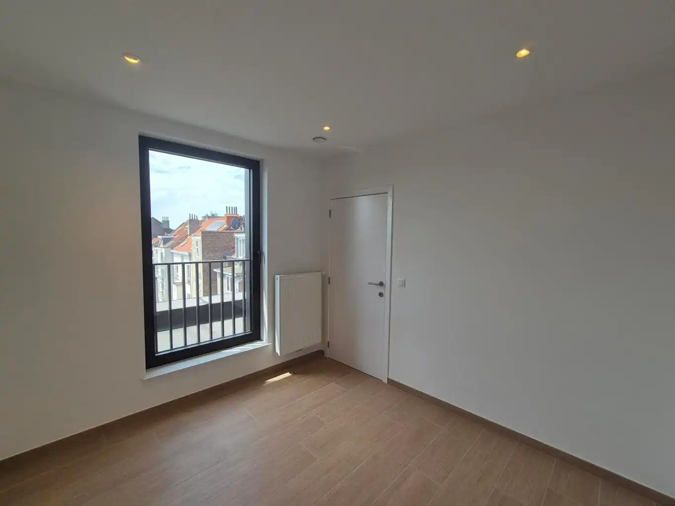 Nieuwbouw duplex met 2 slpks, bureel, terras en kelder foto 8