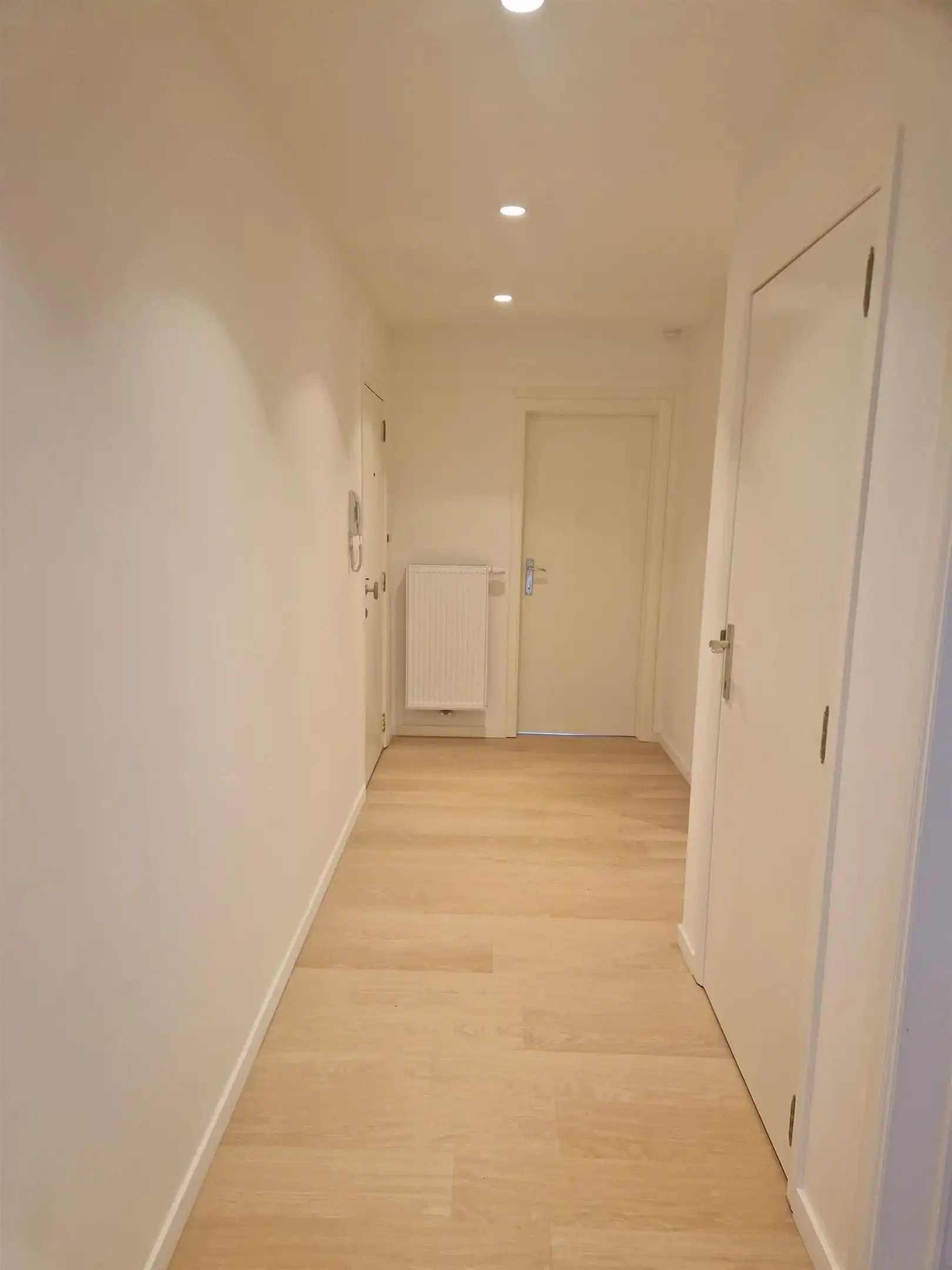 Gelijkvloers appartement met grote privatieve tuin. foto 5