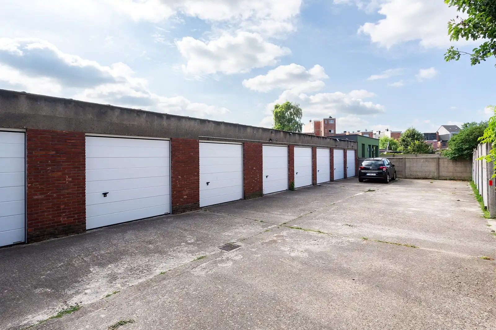 Opbrengsteigendom met 6 appartementen en 9 garageboxen foto 5