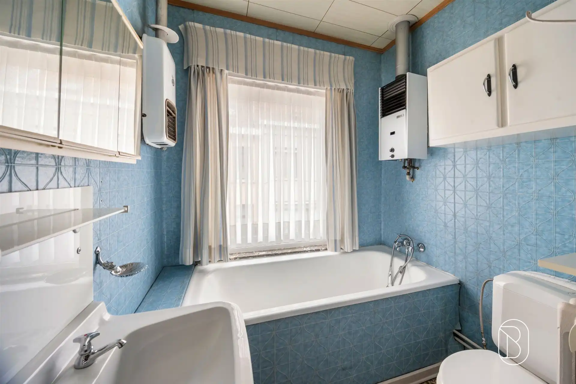 Degelijke woning met veel potentieel & aangename tuin  foto 18