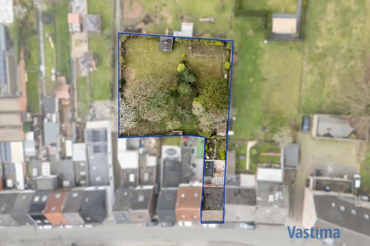 Te renoveren woning met tuin nabij OLV-Ziekenhuis foto 2