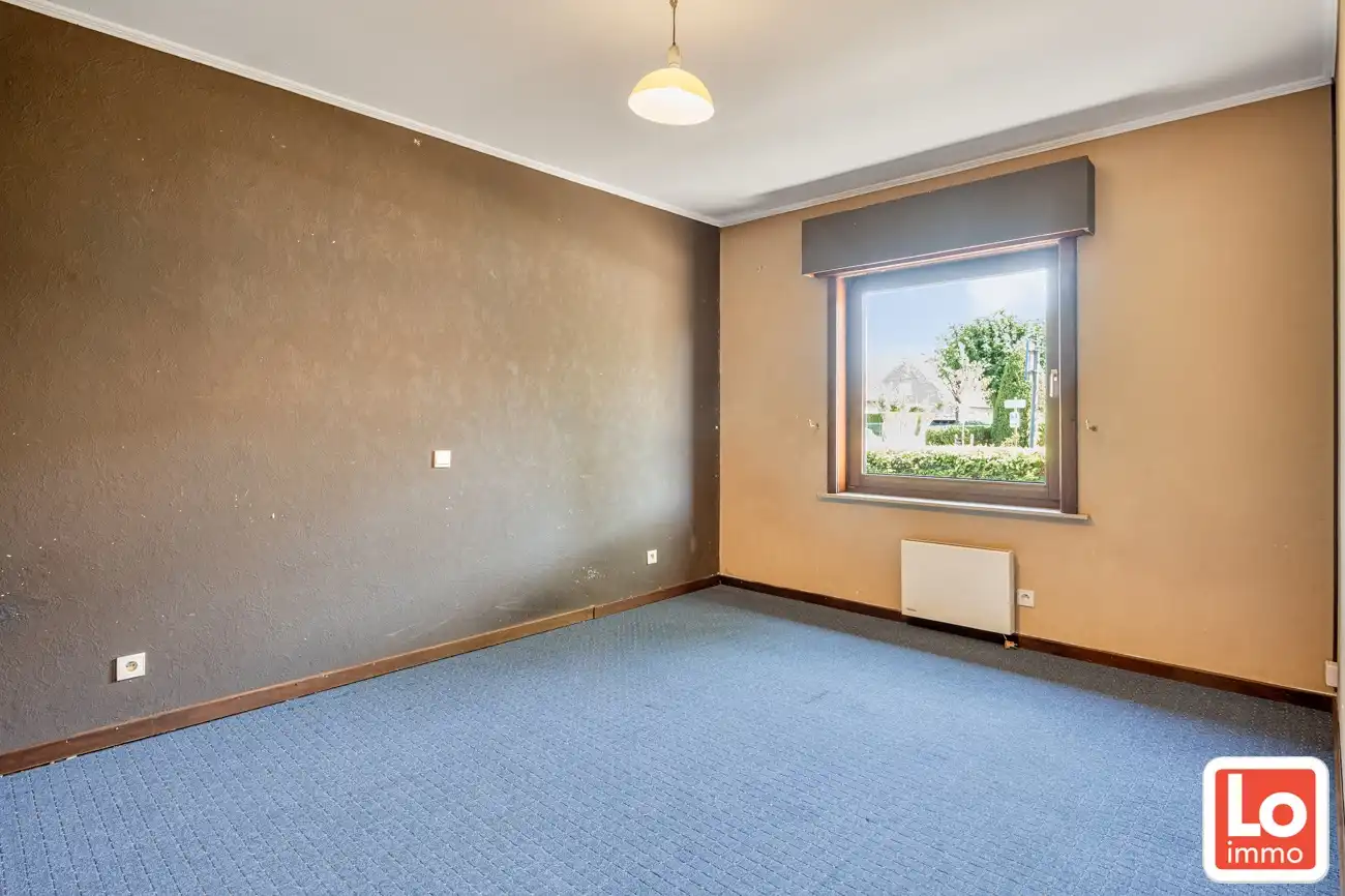 Gelijkvloerse open woning met dubbele inpandige garage en zonnige tuin op een toplocatie nabij het centrum van Lochristi! foto 12
