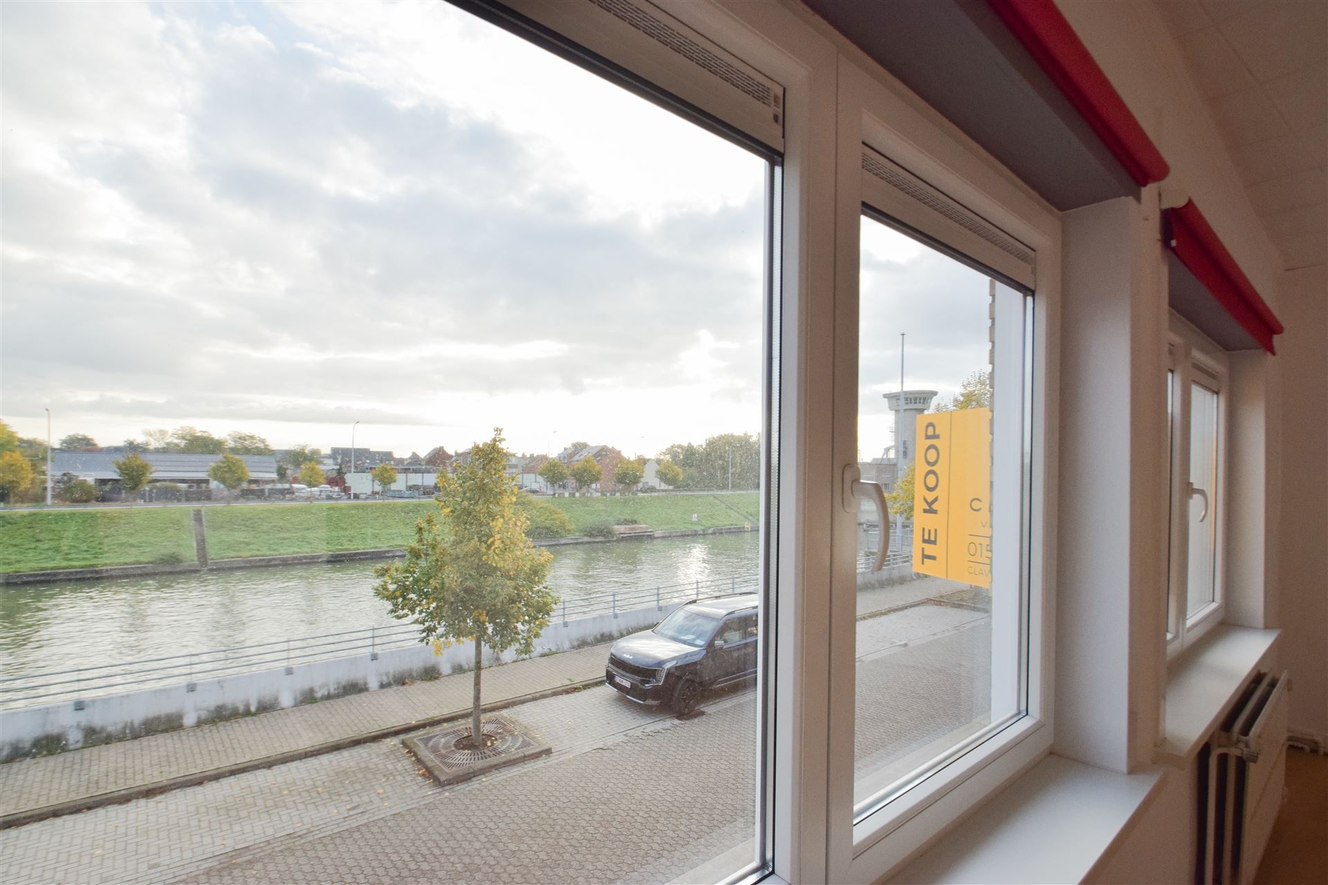Op te frissen woning met stockagezolder aan de vaart. foto 10