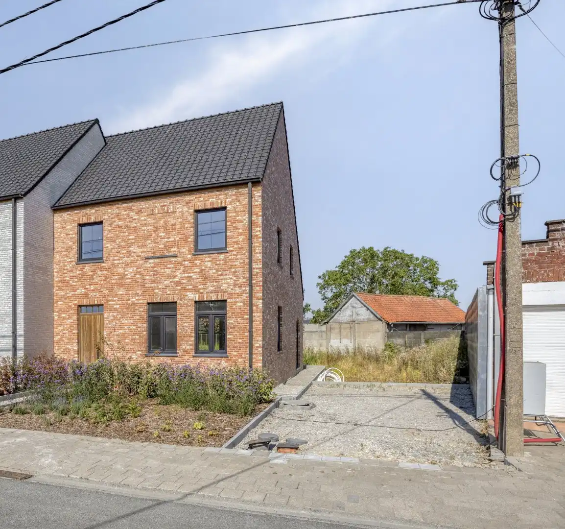 Energiezuinige nieuwbouwwoning in landelijke stijl te Koekelare foto {{pictureIndex}}