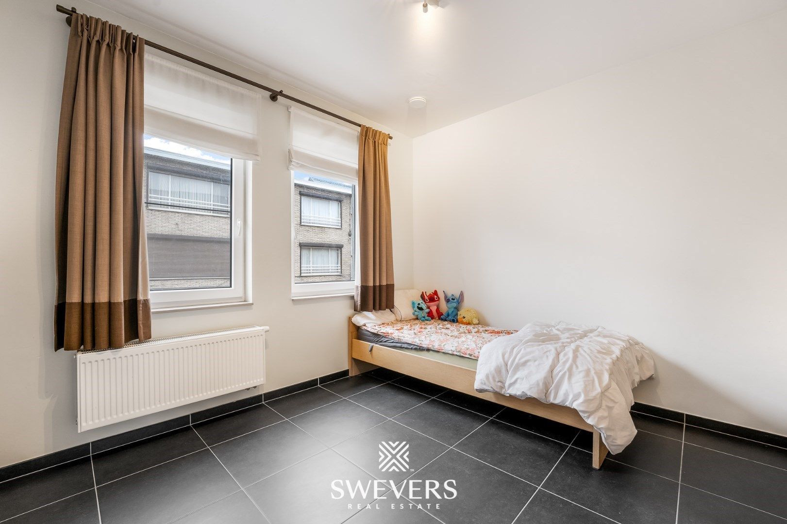 Instapklare rijwoning in centrum Tessenderlo foto 16