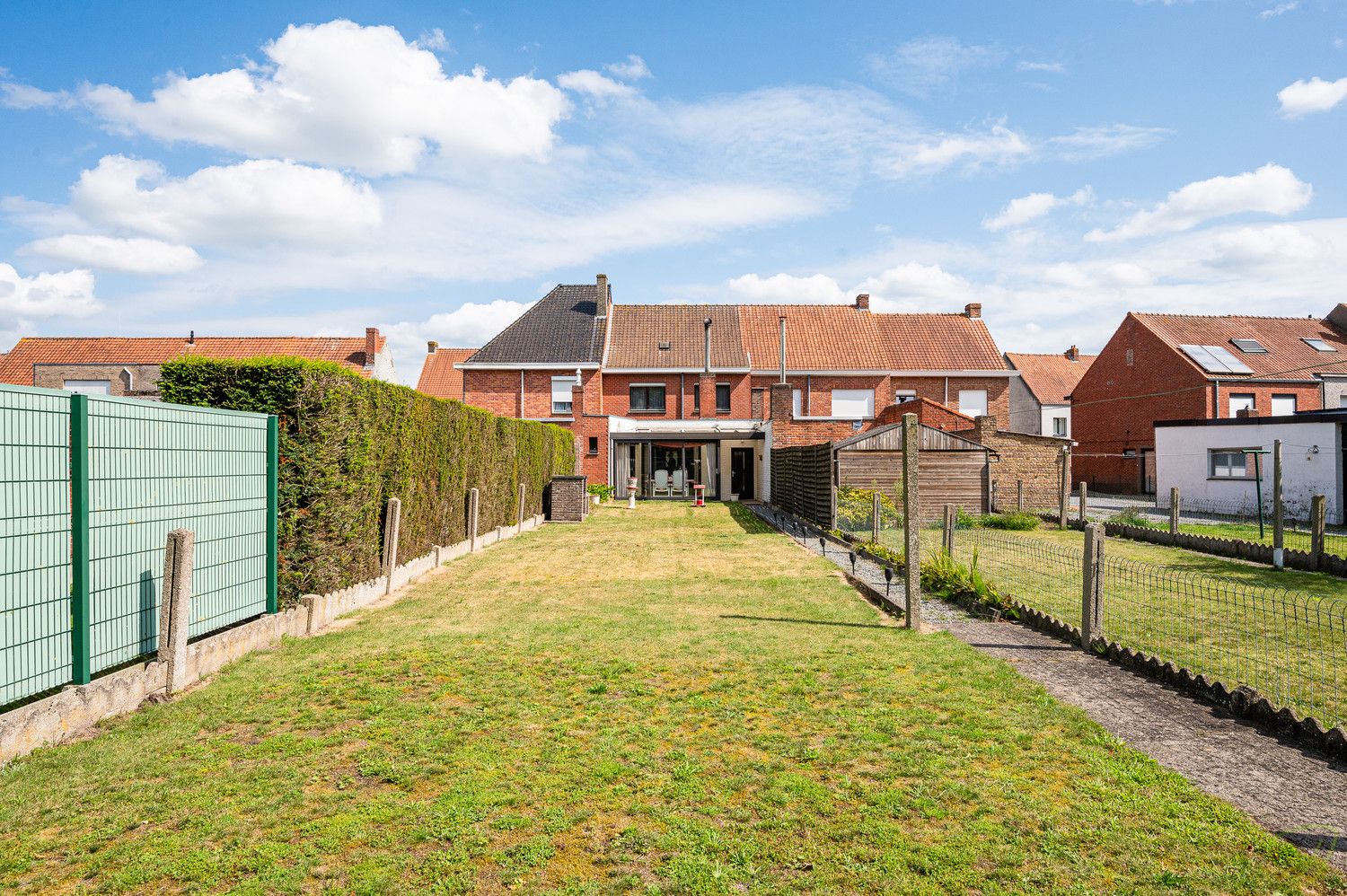 Verrassend ruime woning met prachtig zuidgerichte tuin in het Mandeweegsken! foto 14